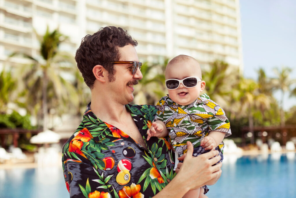 Father and his son with hawaian shirts