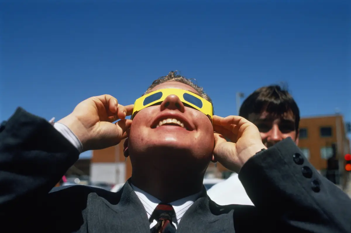 Man Drinking Cocktail In Sea